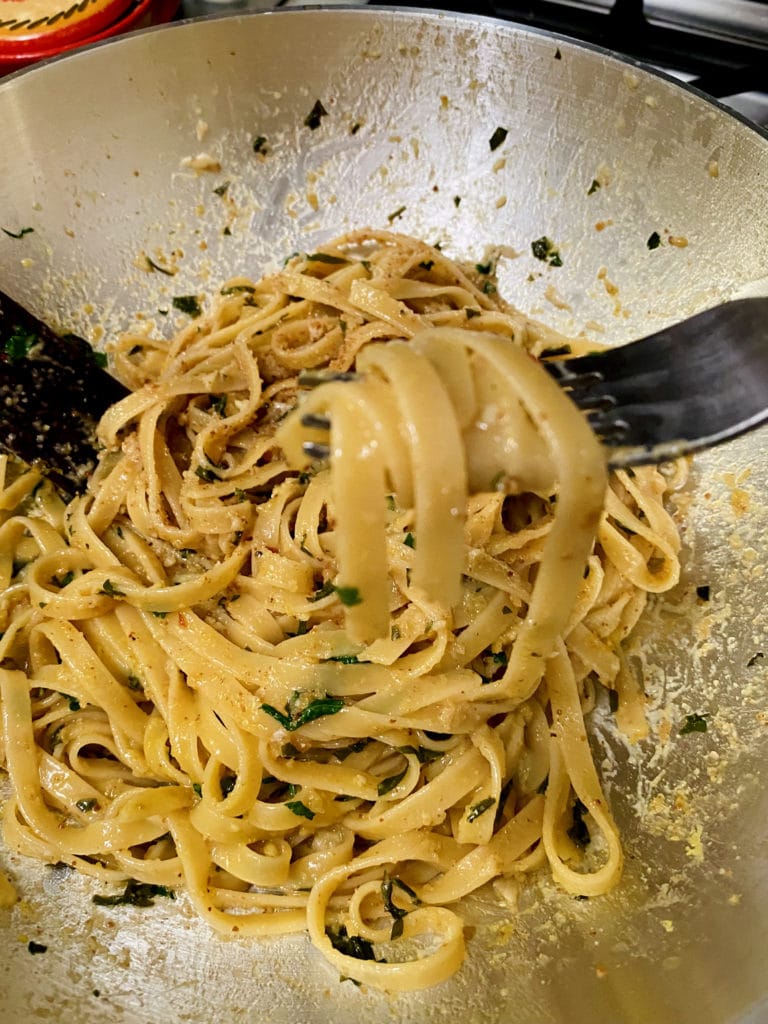 pasta on fork to taste.