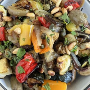 Overhead photo of roasted vegetable caponata in white bowl.