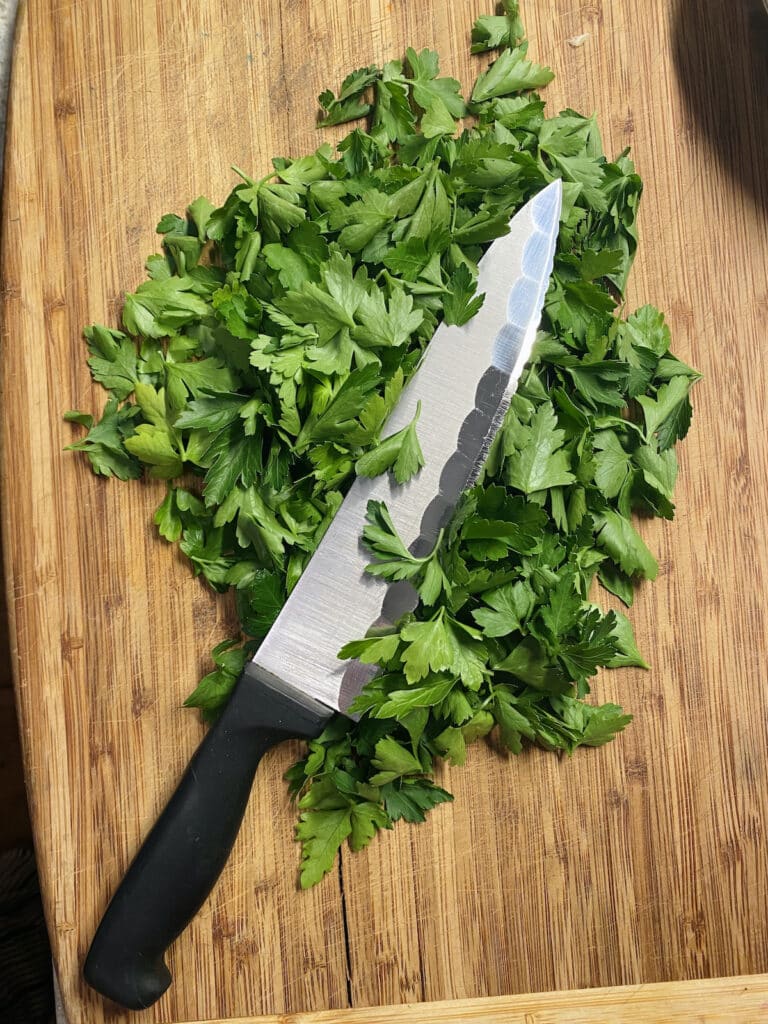 Chopping parsley.