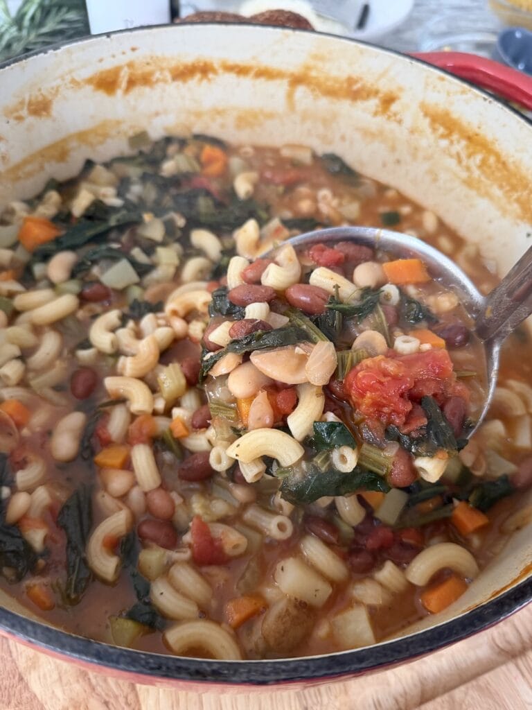 Ladle in pot of soup.
