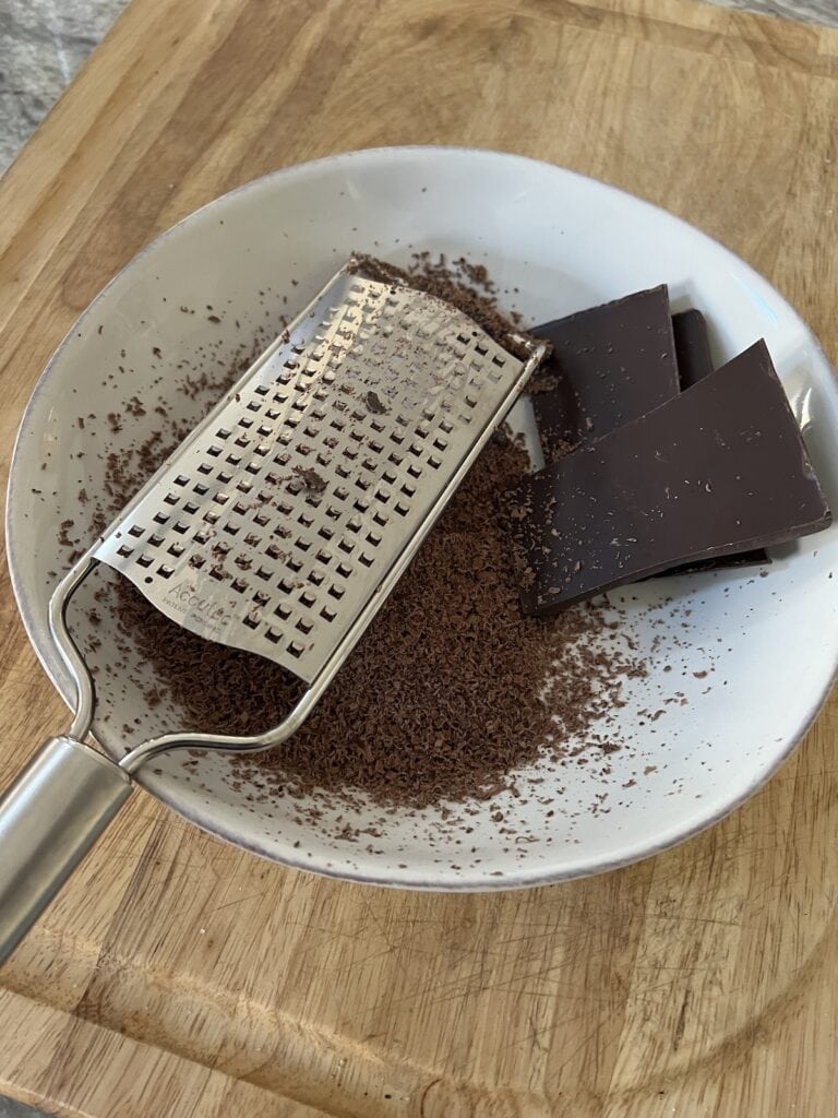 Grating chocolate.