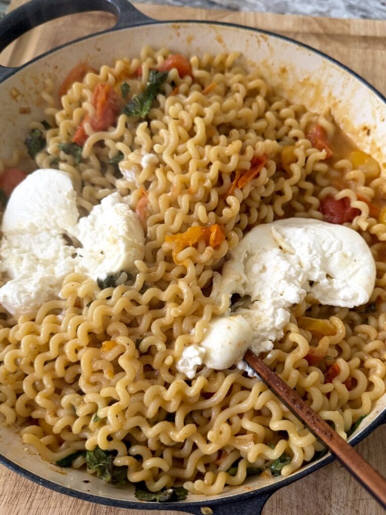 Burrata cheese added to Cherry Tomato Pasta.