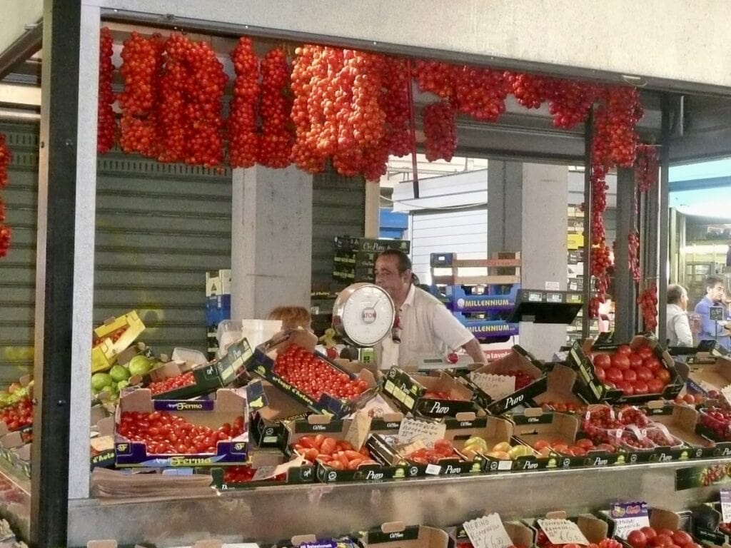 The Tomato Guy in Roma at his tomato stand–a huge inspiration for this collection of fresh tomato recipes.