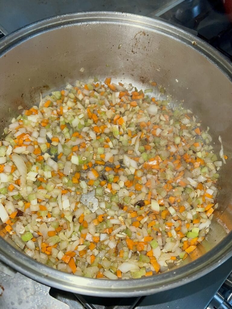 Softened aromatics in pot after cooking about 5 minutes.