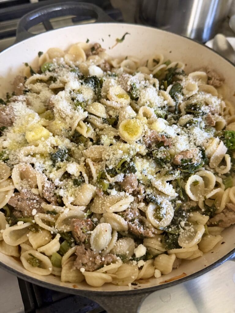 Grated cheese just sprinkled over the finished dish.