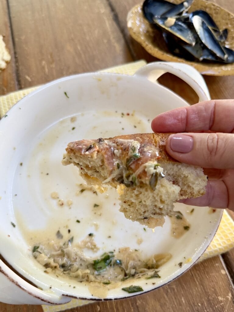 Bread soaked with white wine mussel sauce.