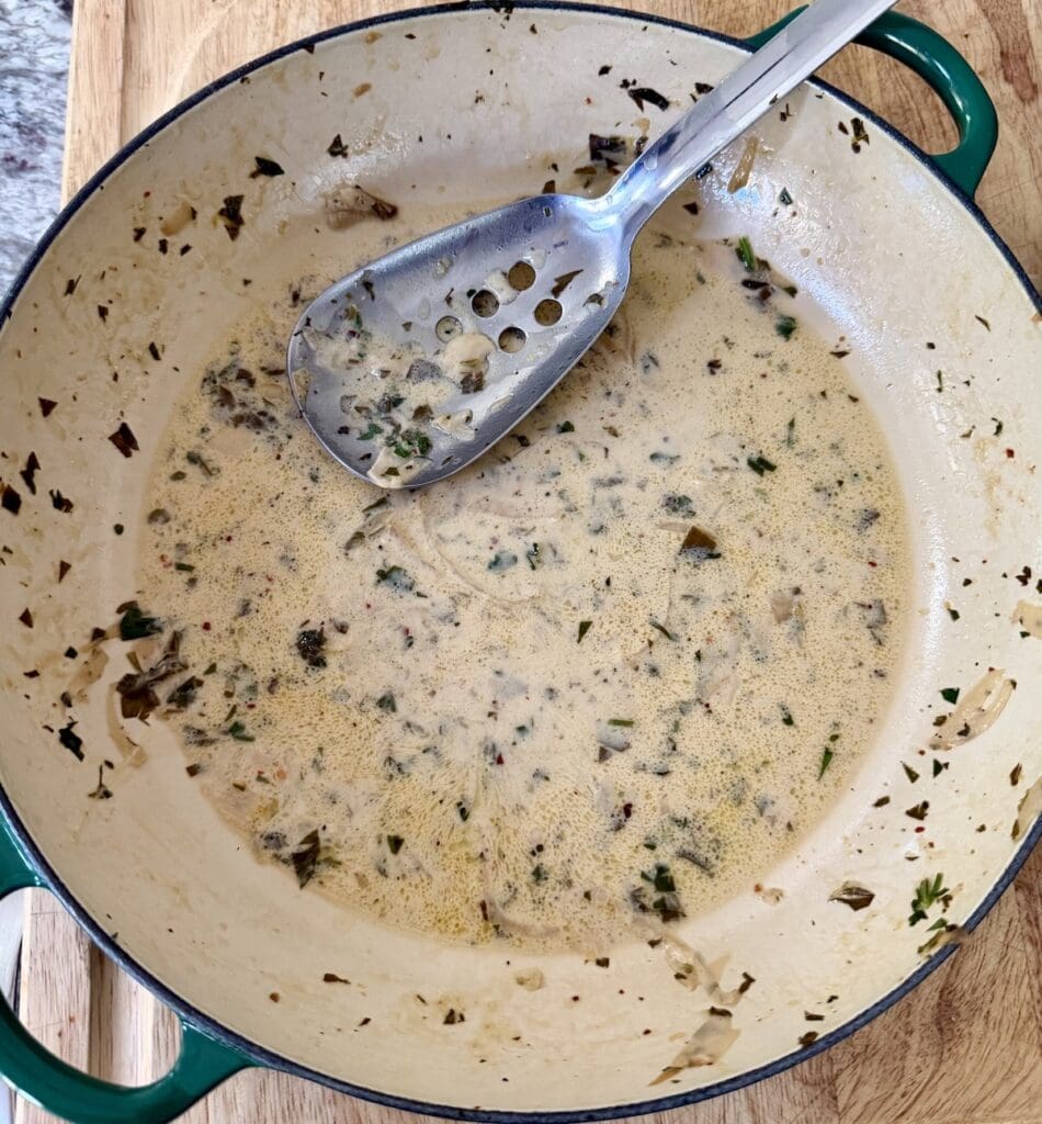 Spon in pan with leftover sauce.