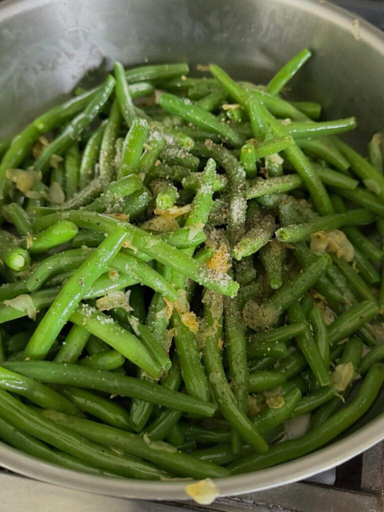 Finished Garlicky Green Beans in sauté pan.